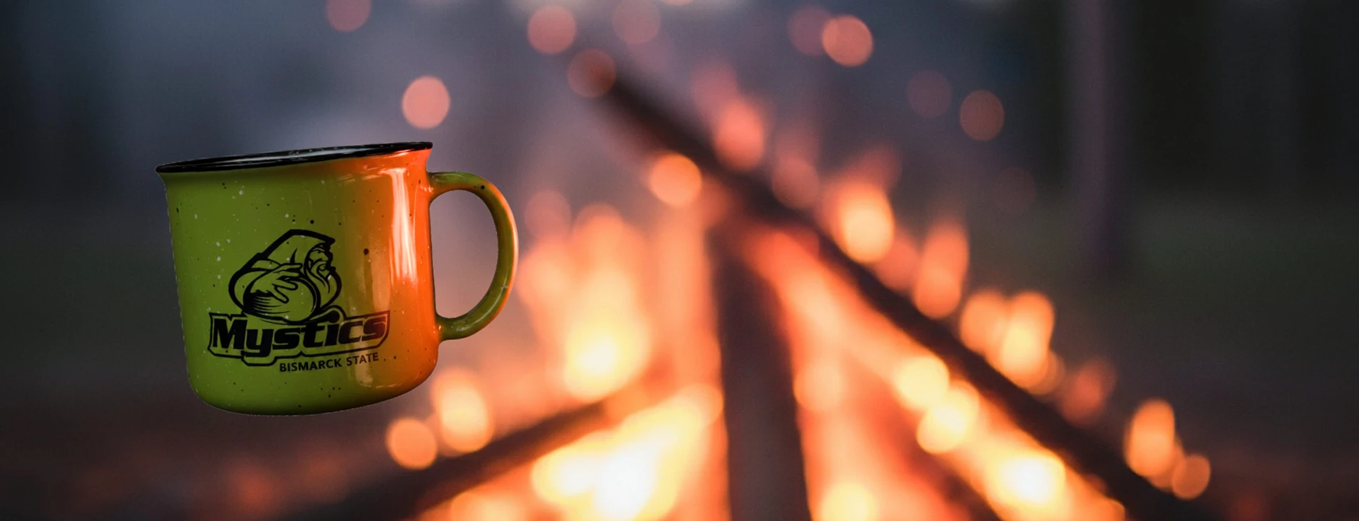 Campfire mugs in front of campfire